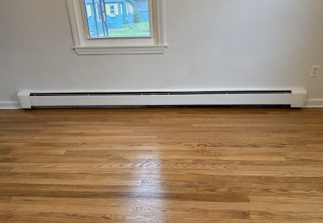 painted interior room in house with wooden floors
