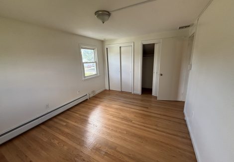 painted interior room in house with wooden floors