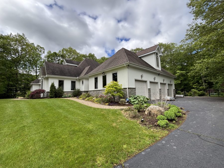 front corner and garage sides of painted home Preview Image 1