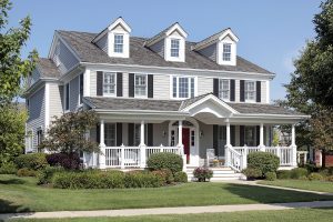 CertaPro Painters white exterior colonial with front farmer's porch and black shutters
