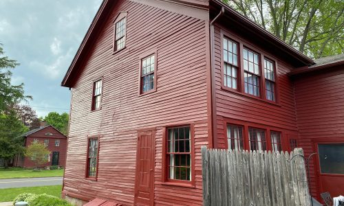 The side door and basement entry doors were also restored and protected.
