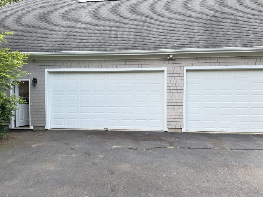 double garage doors and driveway of home Preview Image 2