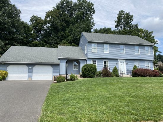 After the vinyl siding was painted.