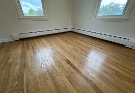 painted interior room in house with wooden floors