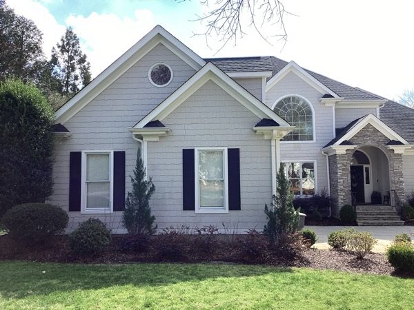 house before repainted black and white Preview Image 2