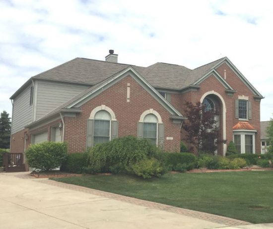 CertaPro of South Oklahoma paints exterior brick and siding.
