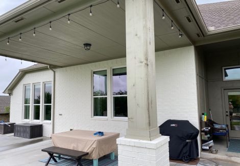 Painting brick exteriors with mixed trim colors.