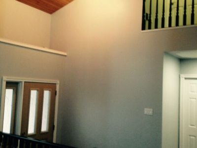 Banister painting by CertaPro house painters in Southern Alberta