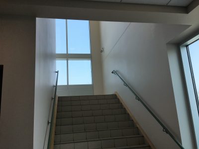 Commercial Stairwell painting by CertaPro Painters in Medicine Hat