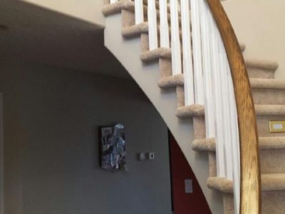 Interior banister painting by CertaPro House Painters in Southern Alberta