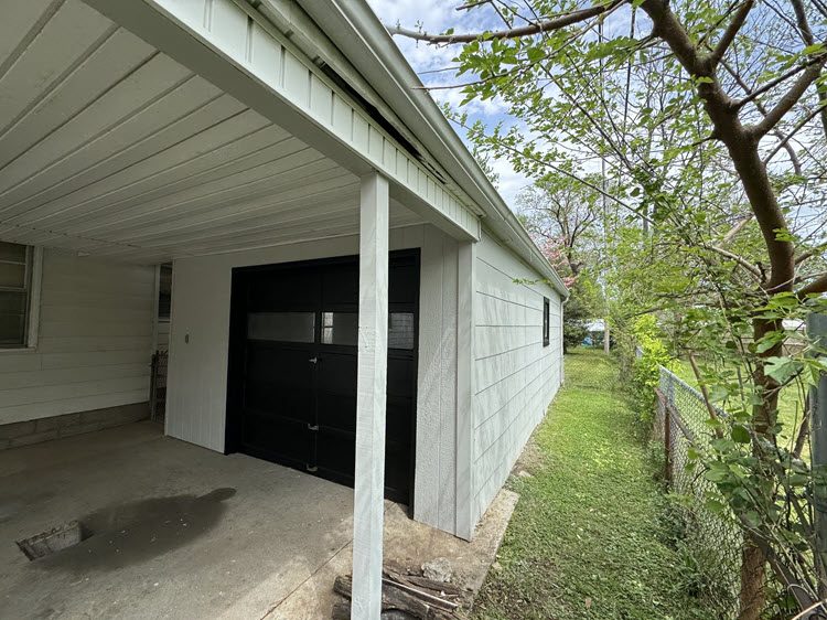 photo of repainted garage door and exterior walls in sellersburg in Preview Image 2