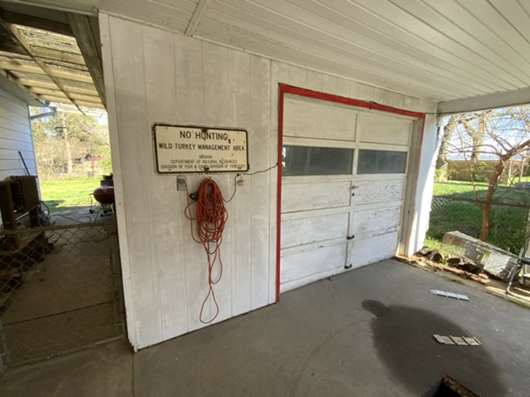 before photo of garage door and exterior walls Preview Image 1