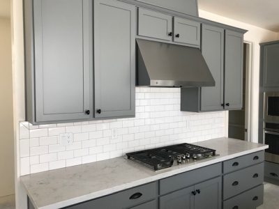 Gray kitchen cabinets painted by CertaPro