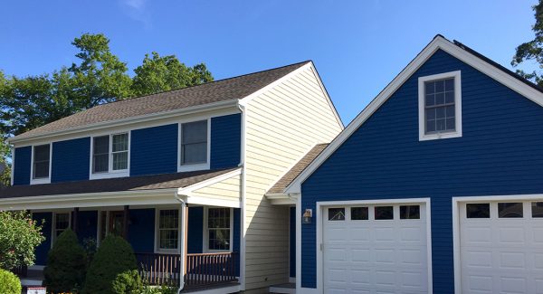 Exterior Blue Home and Garage