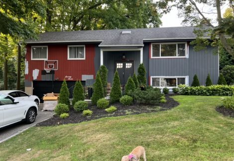 In Progress Gray Exterior House Painting