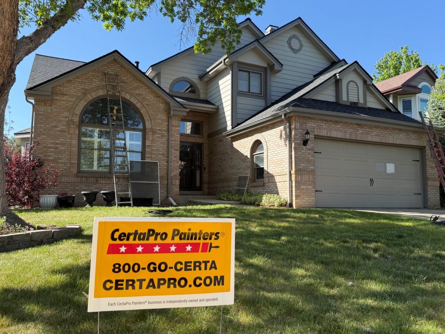 certapro sign in front yard of stone and siding home