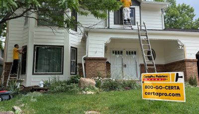 painters working on home exterior
