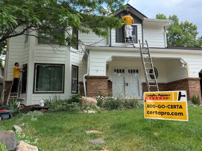 painters working on home exterior