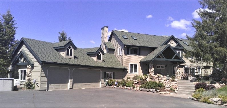 Wood siding exterior painting by CertaPro Painters of Spokane, WA Preview Image 1