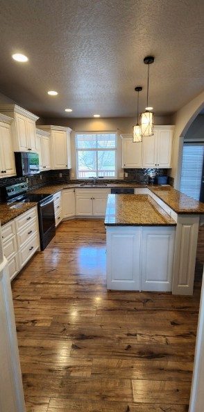 Interior kitchen cabinet painting in Couer d'Alene, Idaho Preview Image 1