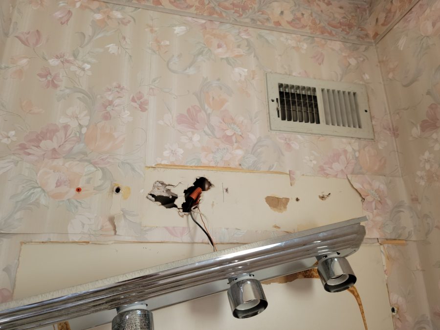 electrical wire hanging out of wall before repairs Preview Image 6