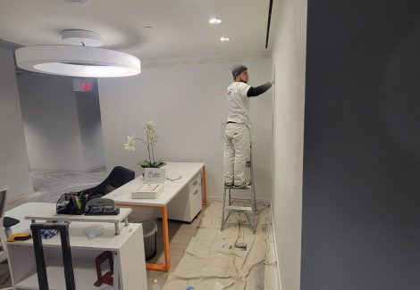 painter working on drywall