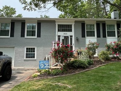 grey home with black shutters