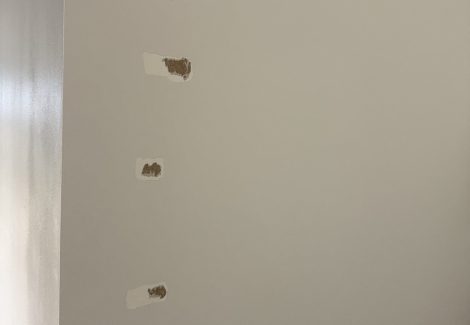 commercial space with damaged drywall