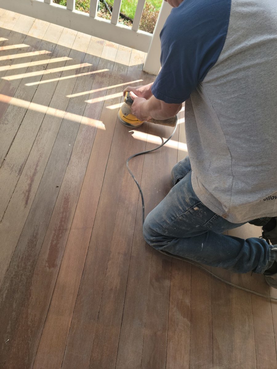 certapro painter in process of porch painting Preview Image 2