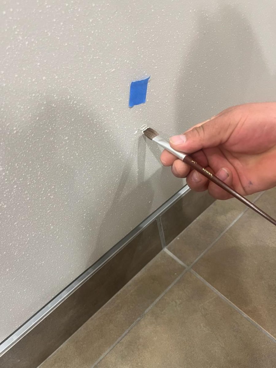 hallway work being done by certapro team memeber in commercial building Preview Image 1