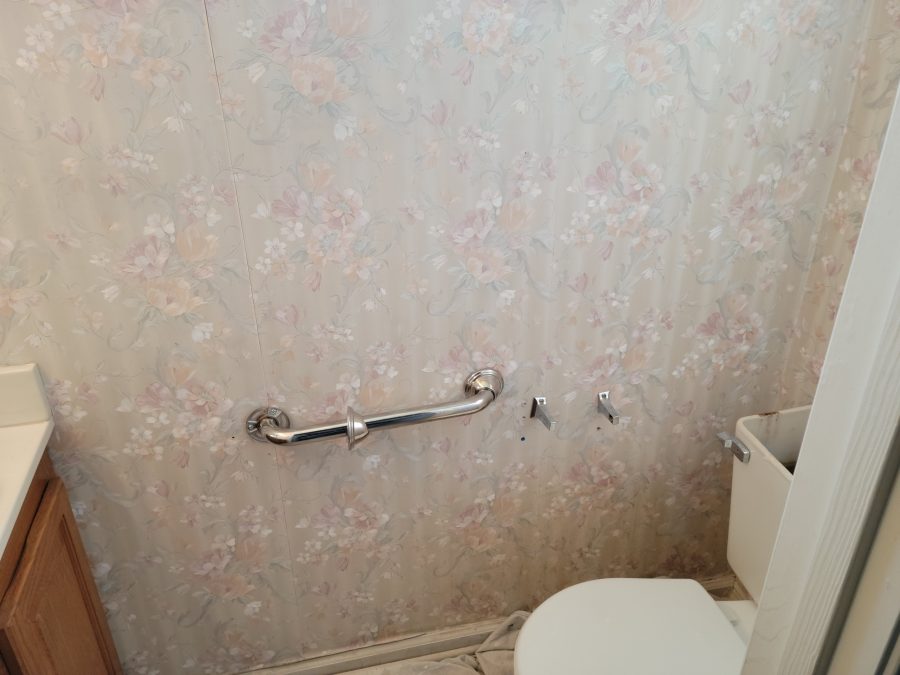 toilet area before painting and repair Preview Image 3