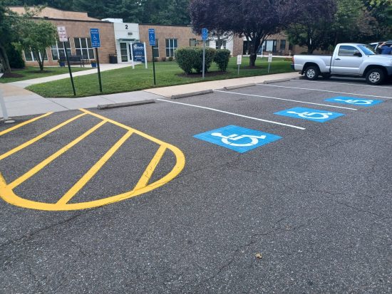painted hanicap and no-parking spot