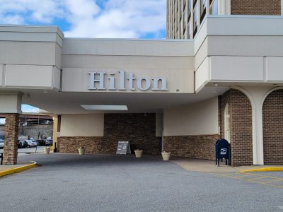 paint and repairs exterior of hilton hotel