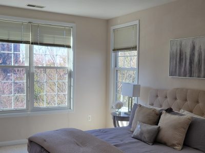 bedroom of condo in alexandria after painting