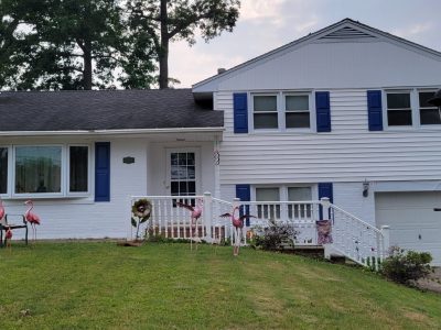 white exterior with dark shutters