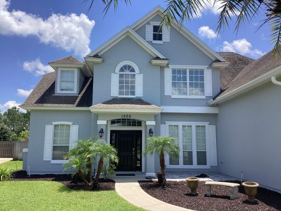 beautiful two story house with freshly painted exterior