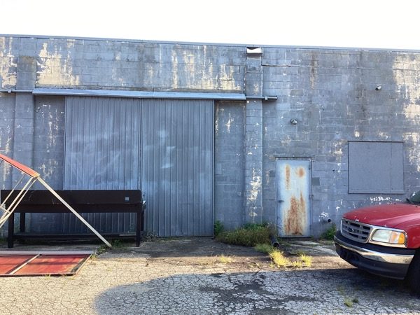 Commercial Exterior Painting Benton Harbor before photo of the back of the building Preview Image 1