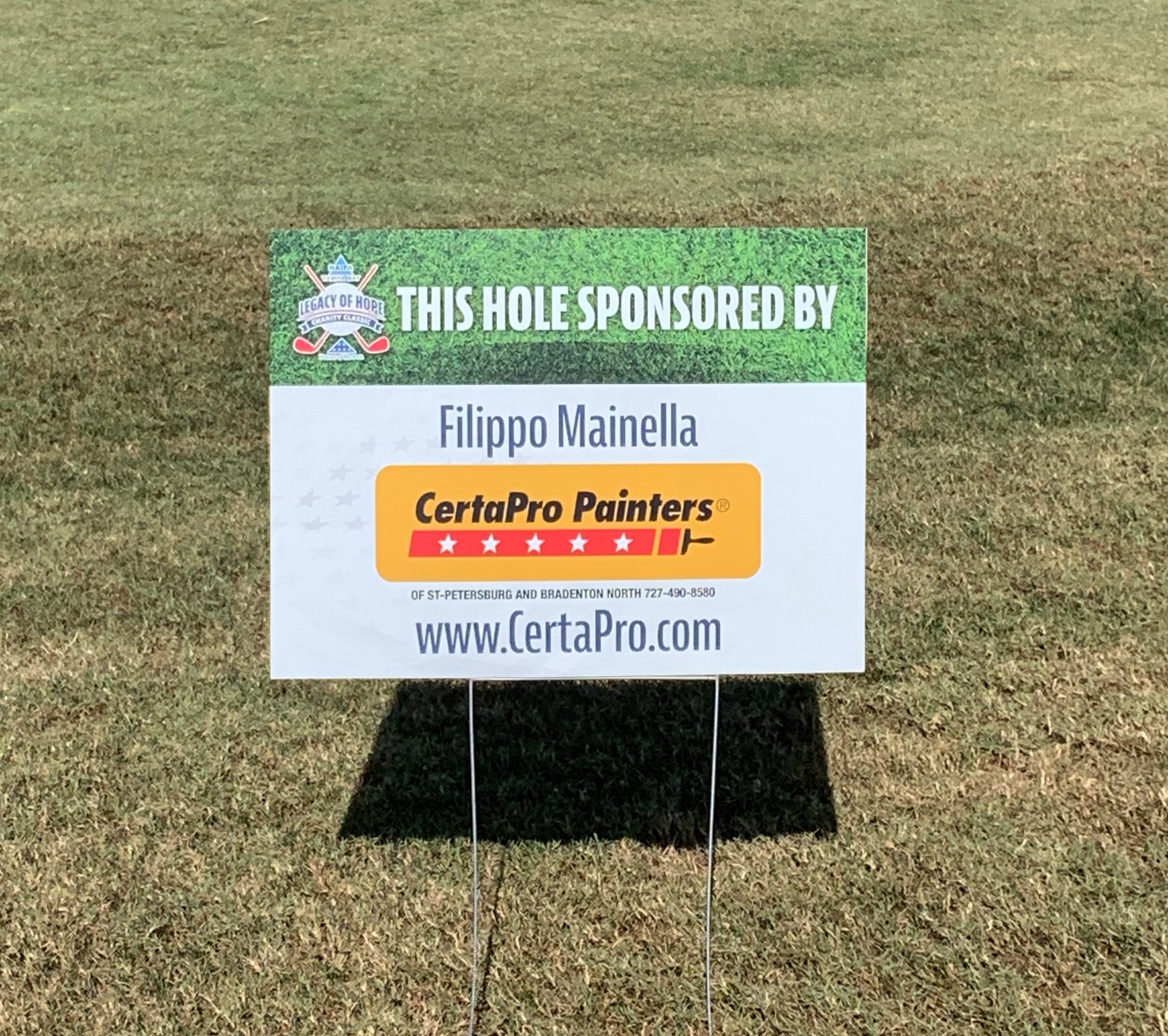 A sign at the Legacy of Hope Golf Classic