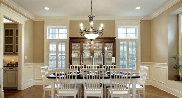 Residential painting in tan colored dining room