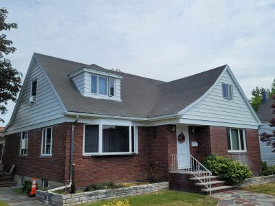 Aluminum siding painting project in Shore Acres, NY