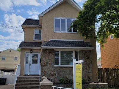 Stucco and wrought iron fence painting