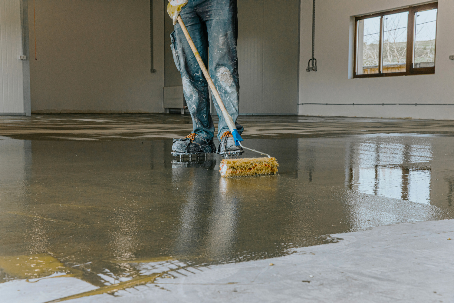 Epoxy garage floor being applied