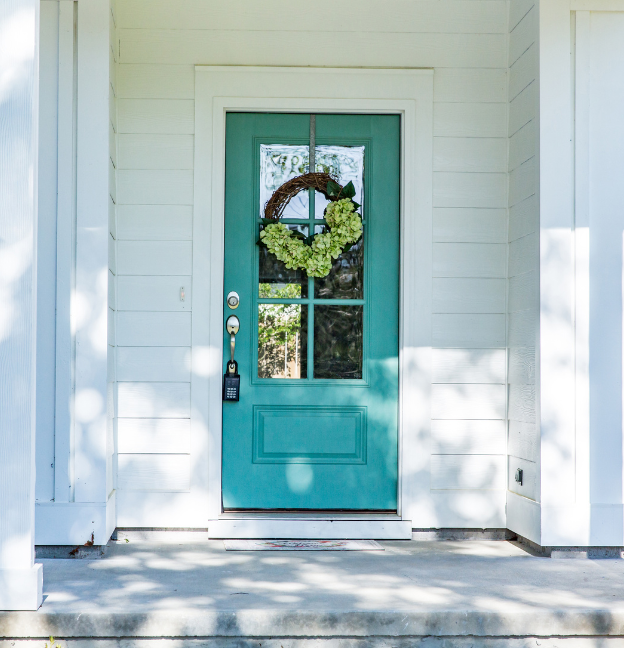 front door painted Peacock Plume by Sherwin-Williams 