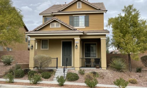 Tan Stucco and Siding Home