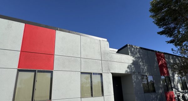 red and white painted exterior of commercial building
