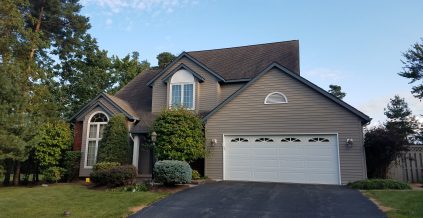 Tan Exterior Single-Family Home