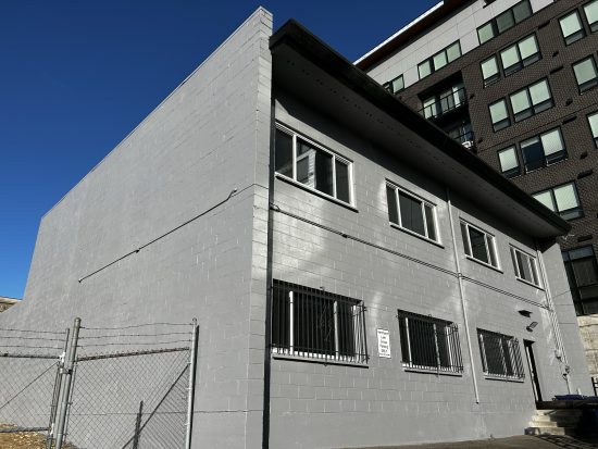 After power washing and a fresh coat of paint the building looked as good as new! We love how it turned out.