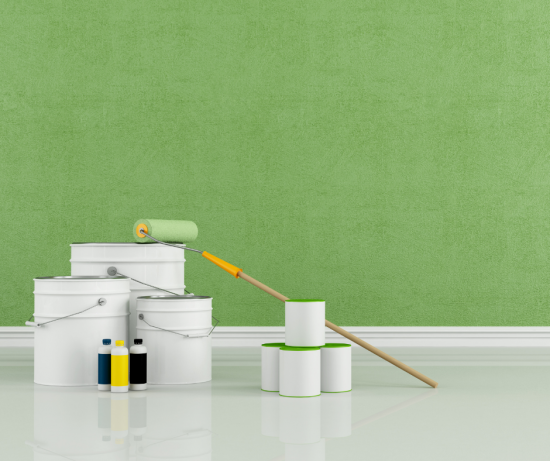 green wall with paint supplies