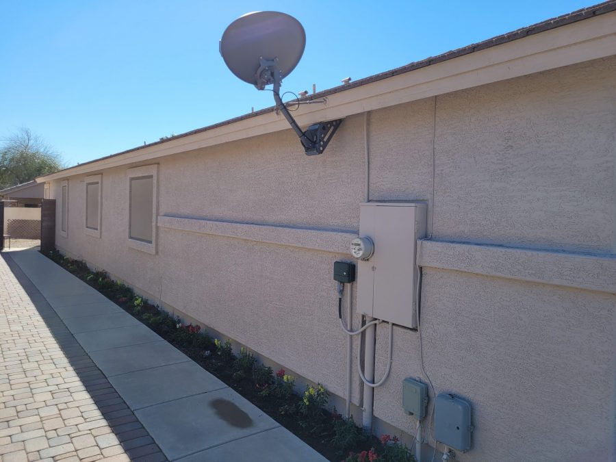 side of stucco home after painting Preview Image 2