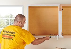 Paint or Stain is Applied to Mounted Cabinets
